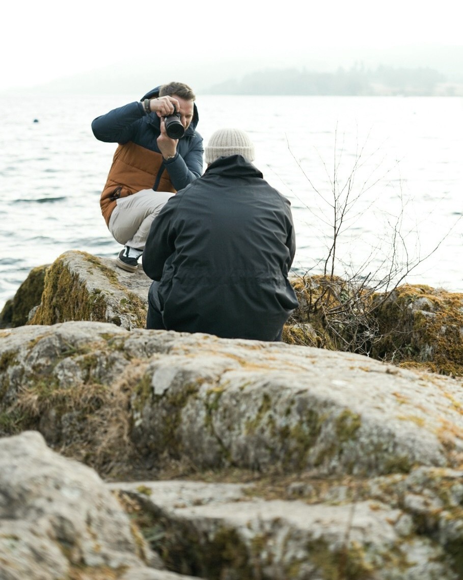 Johan Greyling photographing a client by the water