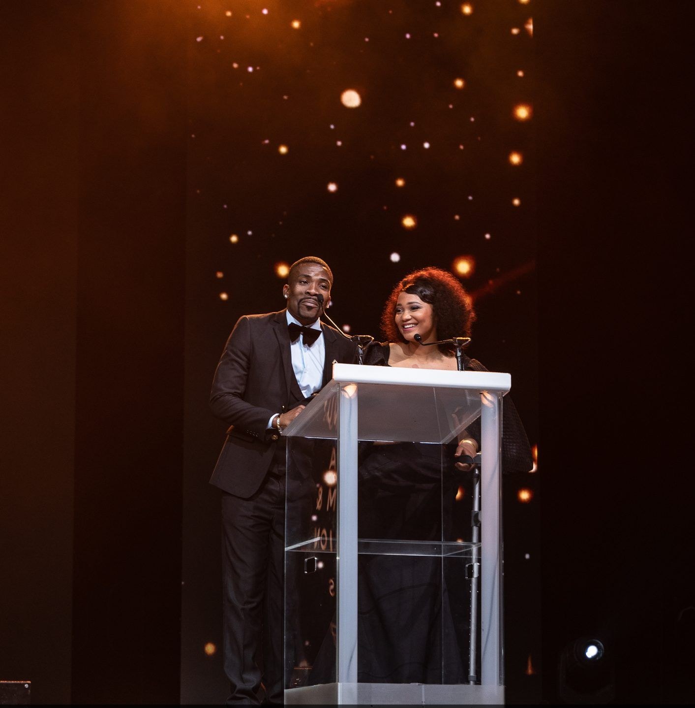 Two presenters at the podium during the KZN Film and Television Awards