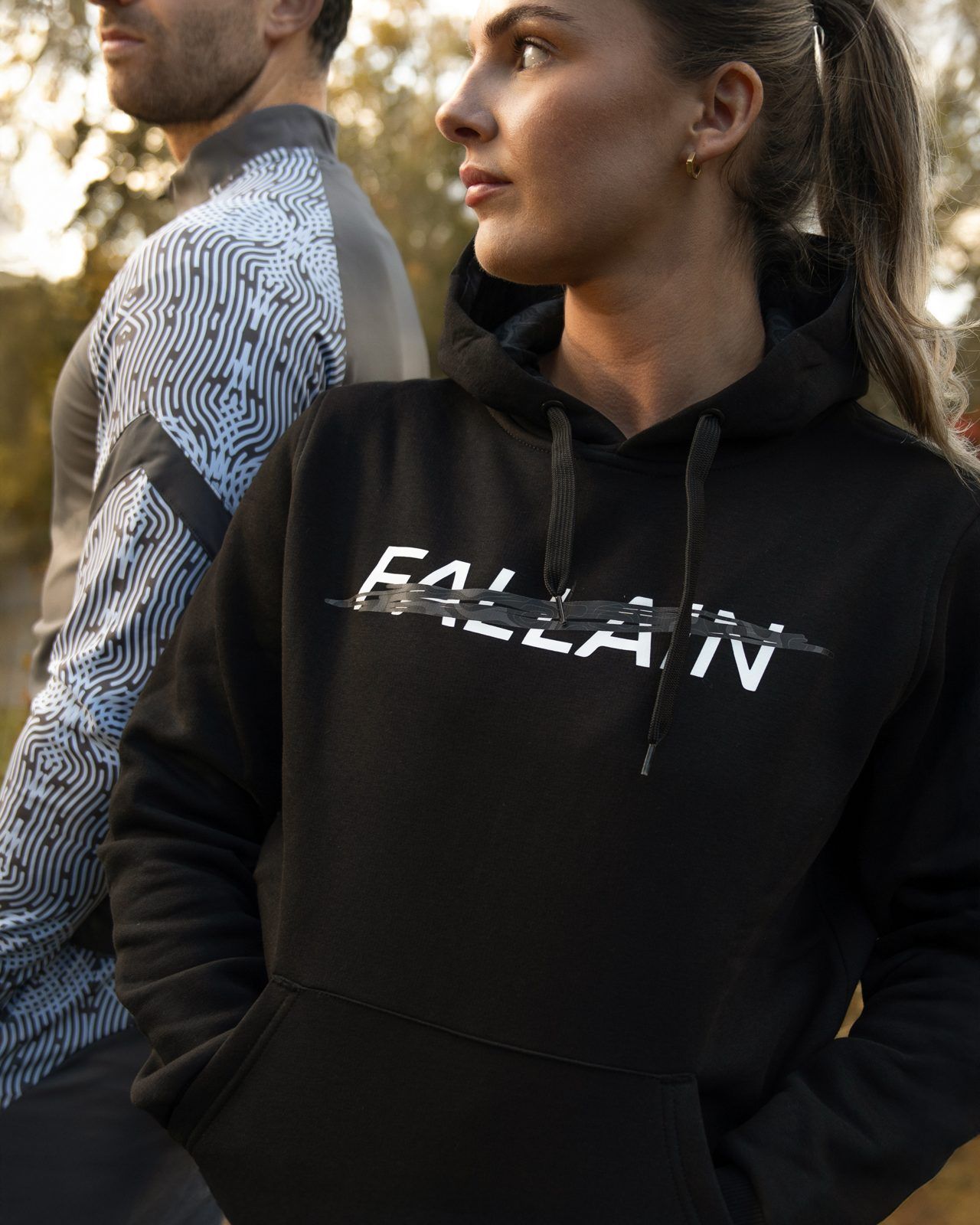 Fallain Fitness campaign, woman in a black hoodie