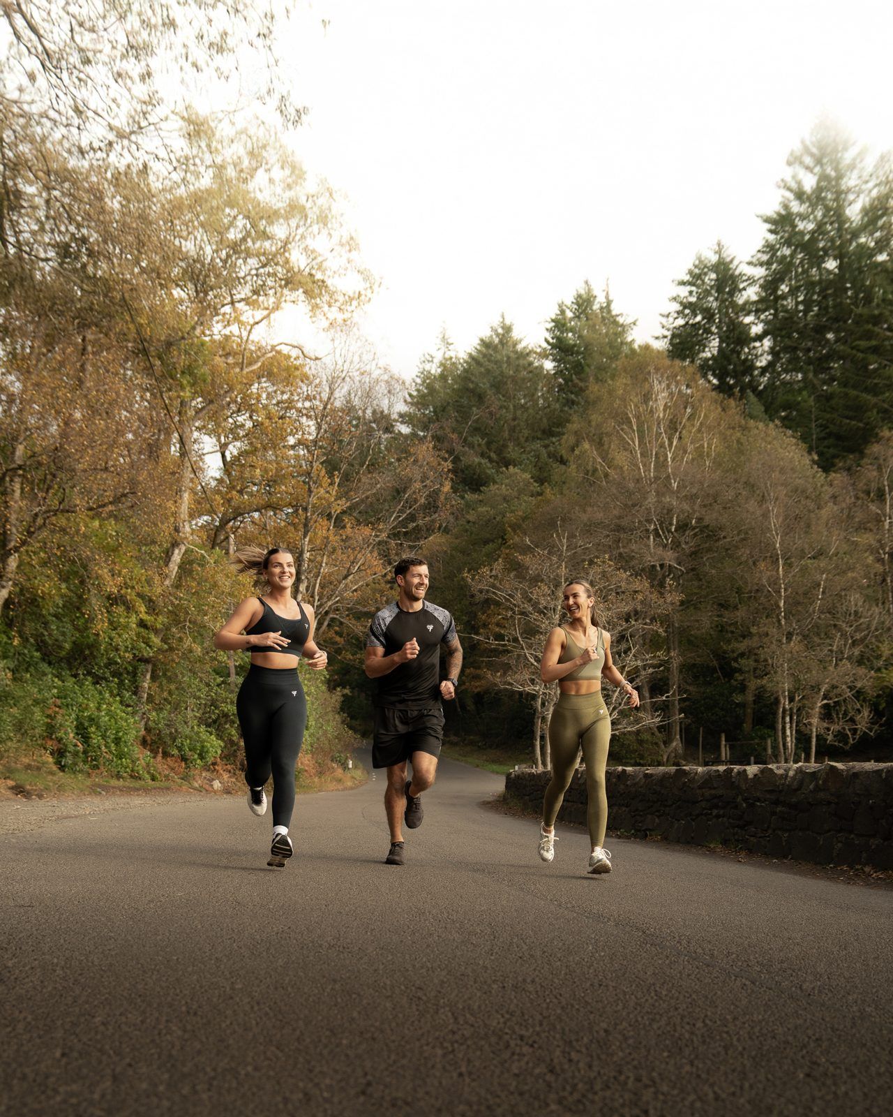 Fallain Fitness campaign photography of three runners on a country road