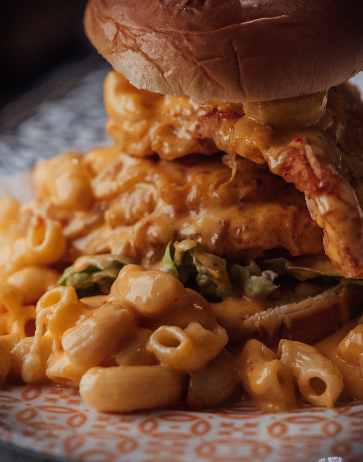 Close up of a loaded mac and cheese burger at Tempura in Ayrshire